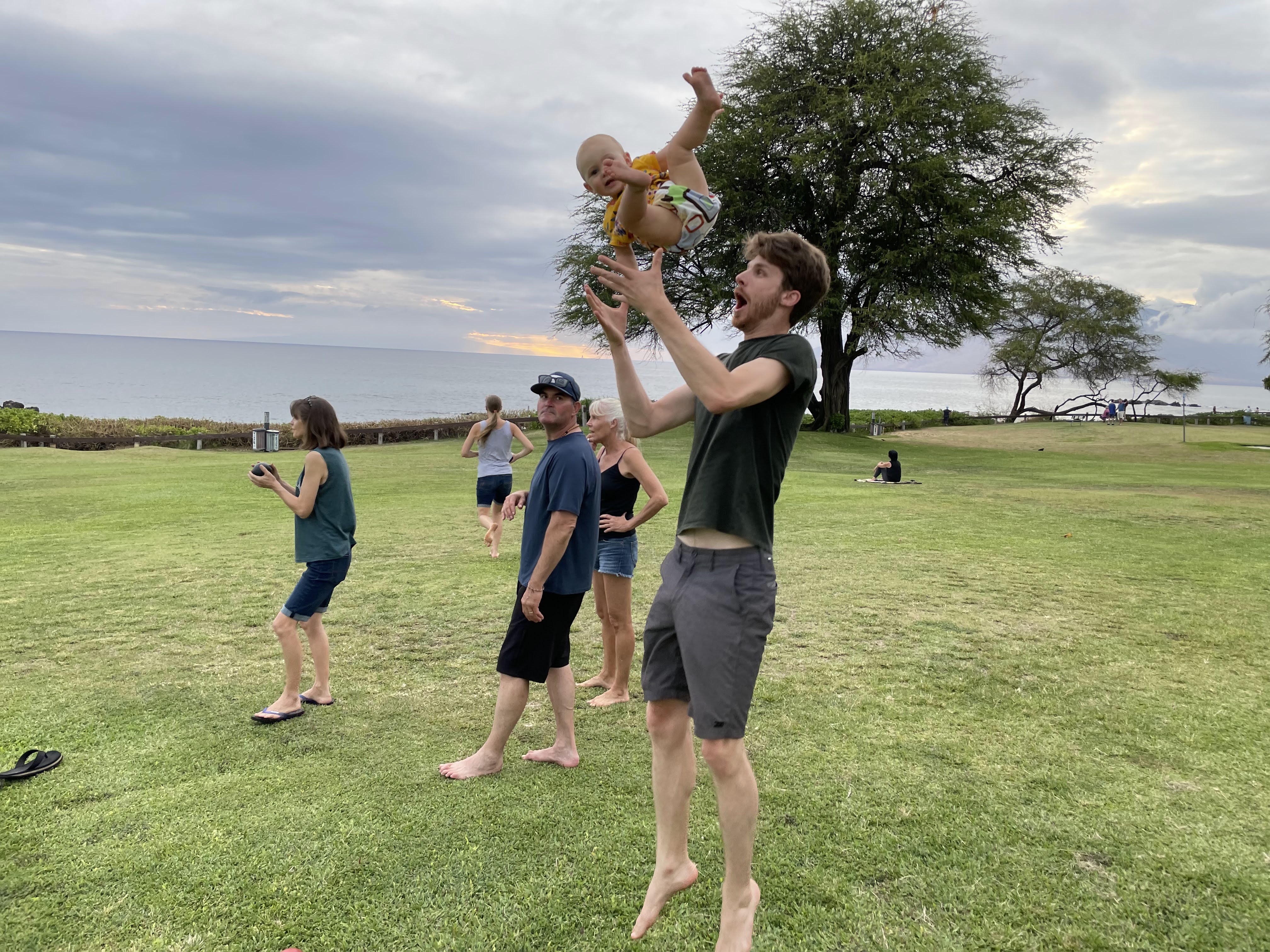 In Kihei, I toss Lily in the air