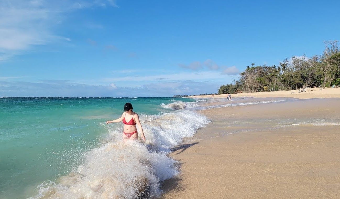 Mattie in the waves at Baldwin Beach