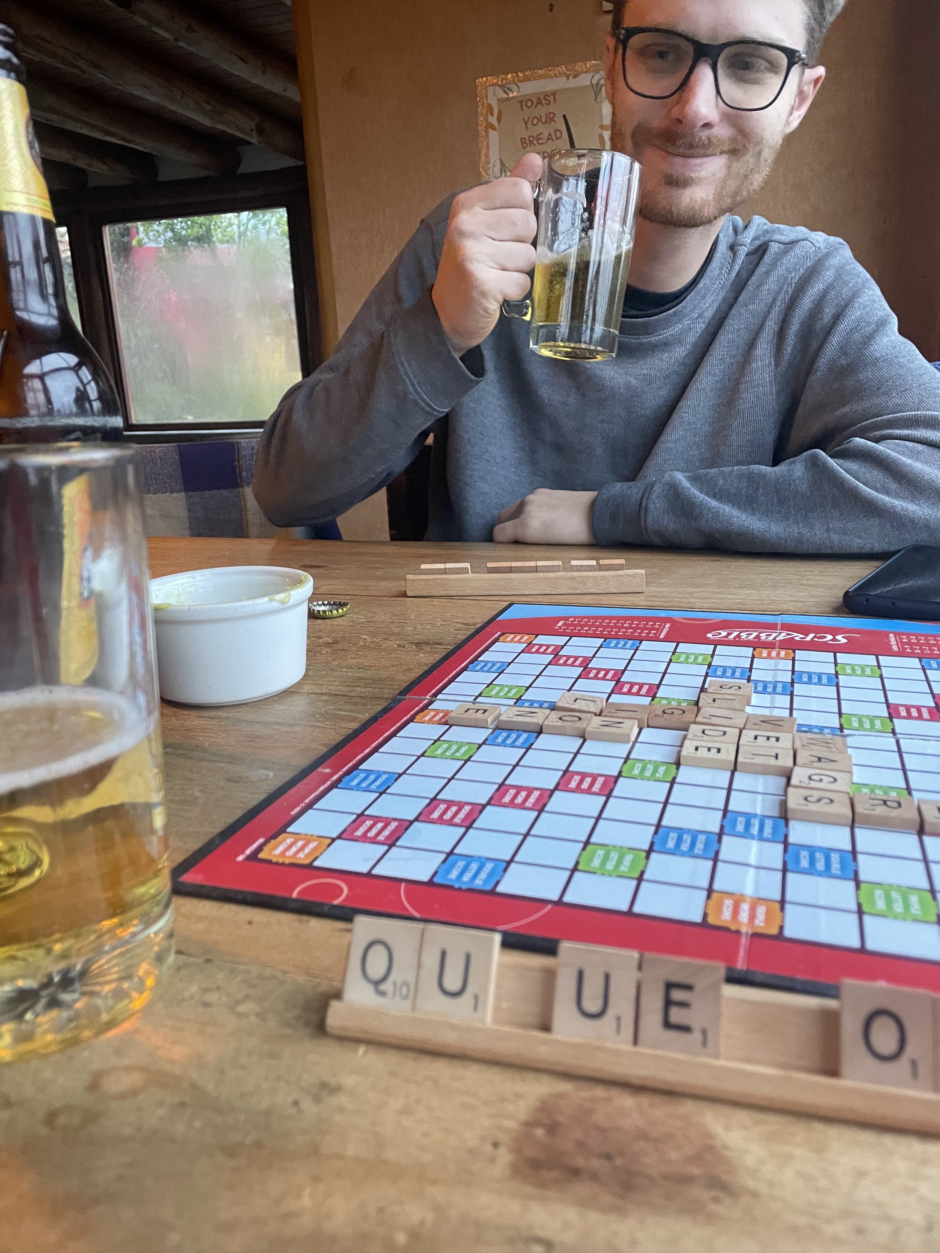 Playing scrabble at the hostel
