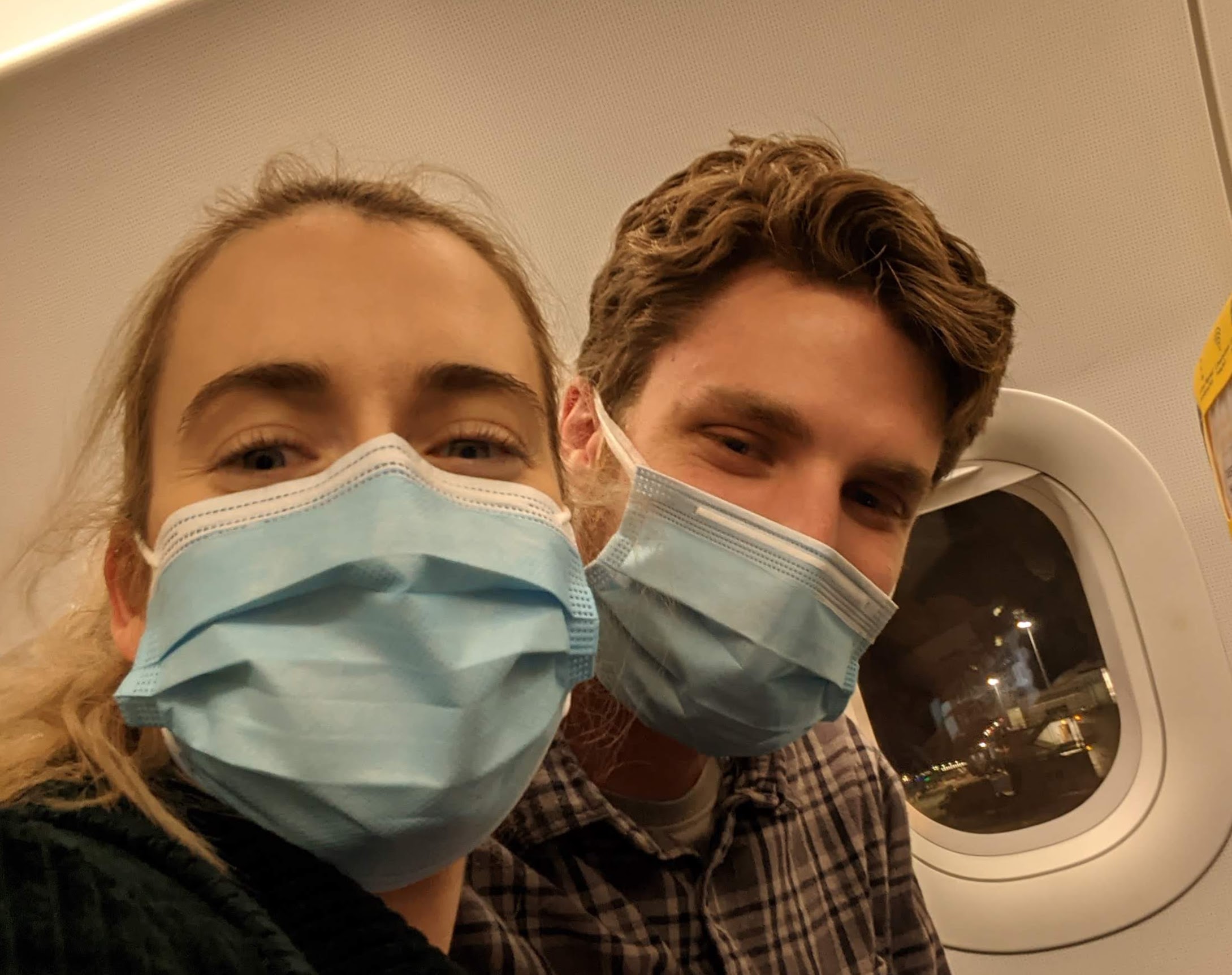 Sheyne and Nelly on the plane on their way to rome