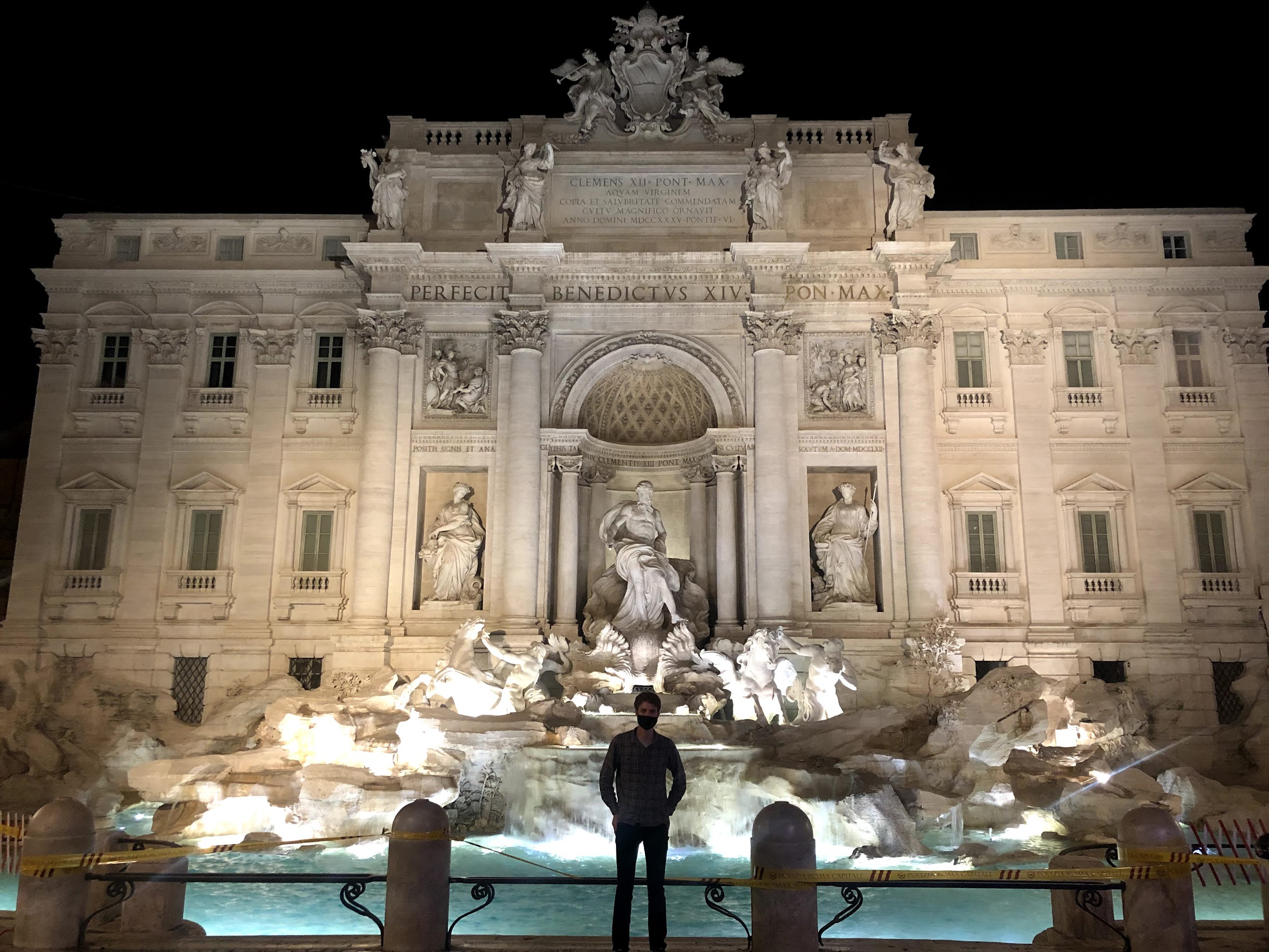 Sheyne standing in front of the Trevi Fountain